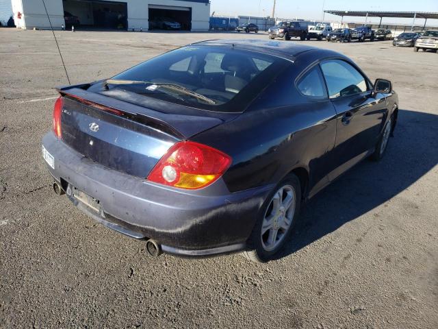 Photo 4 from auction – 2004 HYUNDAI TIBURON with VIN KMHHM65D84U138479