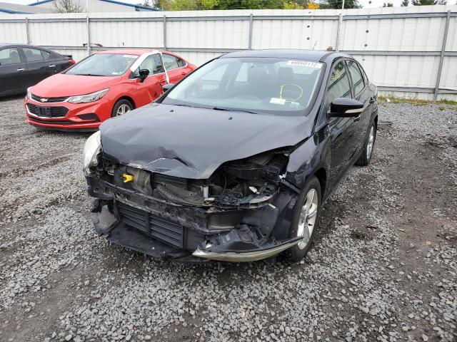 Photo 2 from auction – 2013 FORD FOCUS SE with VIN 1FADP3F20DL330299