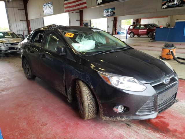 FORD FOCUS SE 2014 with VIN 1FADP3F29EL215539 - Photo from auction