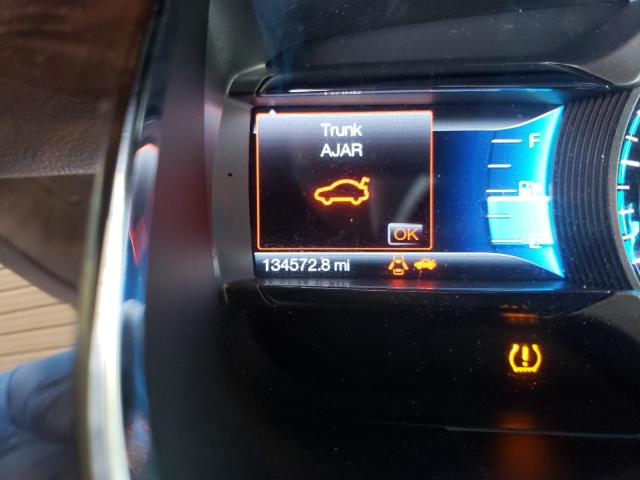 Photo 8 from auction – 2014 FORD TAURUS LIM with VIN 1FAHP2F85EG111347