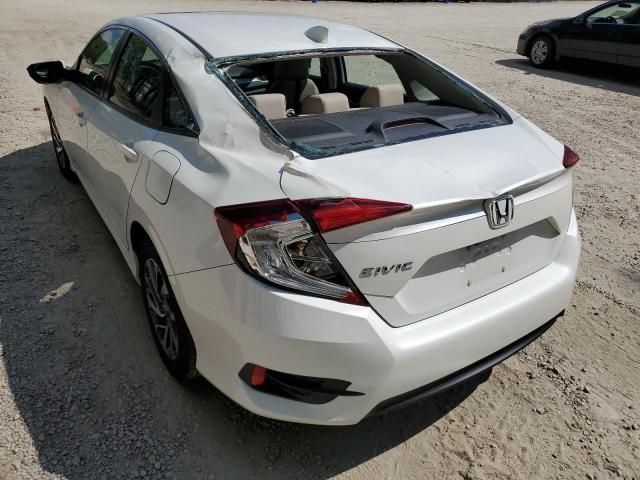 Photo 9 from auction – 2018 HONDA CIVIC EX with VIN 19XFC2F75JE209826