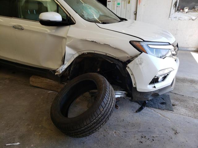 Photo 9 from auction – 2018 HONDA PILOT ELIT with VIN 5FNYF6H00JB014220