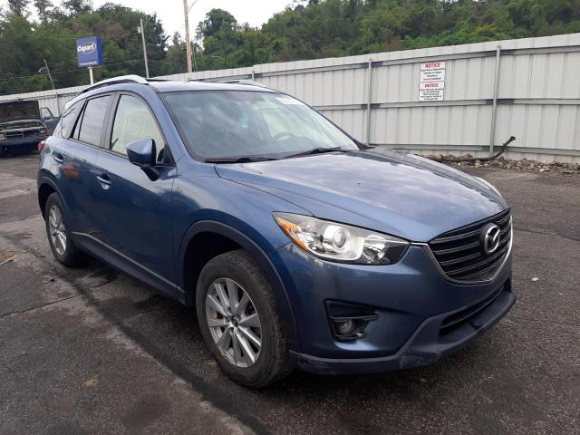 MAZDA CX-5 TOURI 2016 with VIN JM3KE4CY5G0666873 - Photo from auction