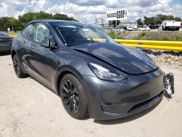TESLA MODEL Y 2022 with VIN 7SAYGDEE9NF481565 - Photo from auction