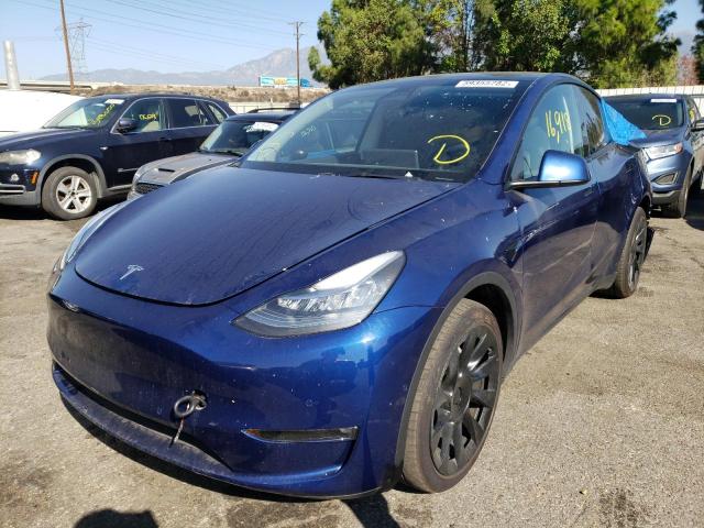 Photo 2 from auction – 2021 TESLA MODEL Y with VIN 5YJYGAEEXMF201064