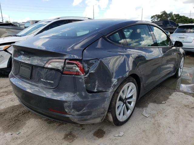 Photo 4 from auction – 2022 TESLA MODEL 3 with VIN 5YJ3E1EB0NF192639