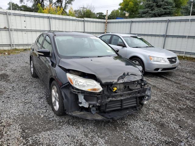 FORD FOCUS SE 2013 with VIN 1FADP3F20DL330299 - Photo from auction