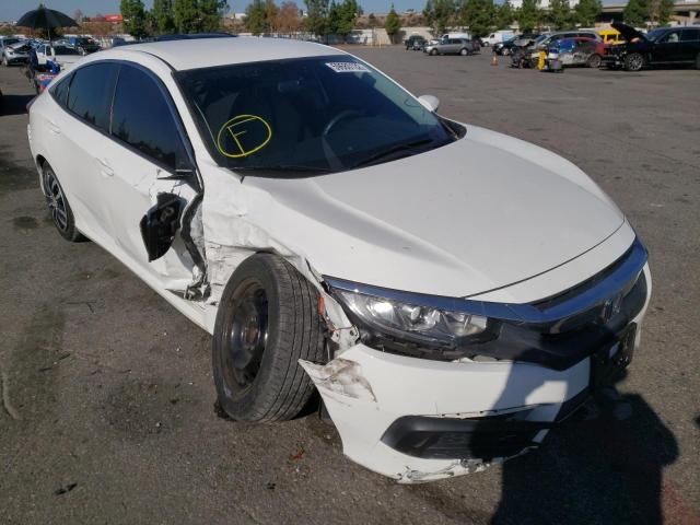 HONDA CIVIC LX 2018 with VIN 2HGFC2F55JH604321 - Photo from auction