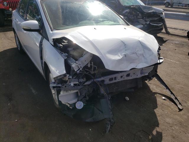 Photo 9 from auction – 2014 FORD FOCUS SE with VIN 1FADP3F25EL453288