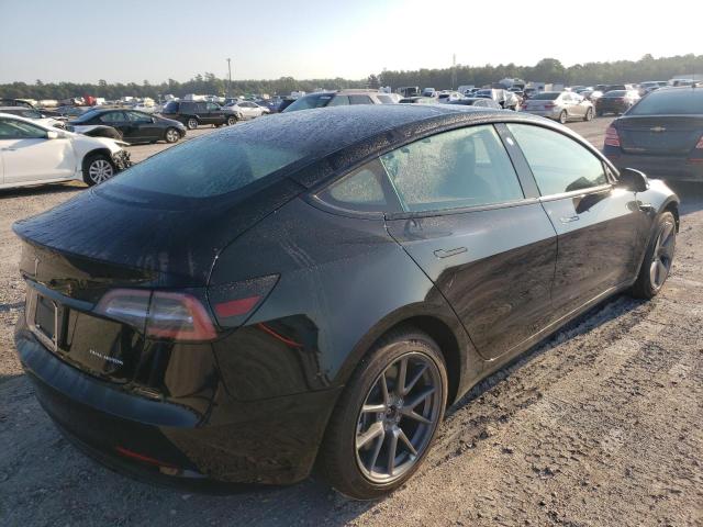 Photo 4 from auction – 2022 TESLA MODEL 3 with VIN 5YJ3E1EB3NF190383