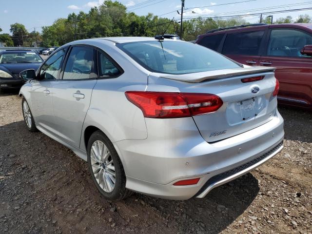 Photo 3 from auction – 2015 FORD FOCUS SE with VIN 1FADP3F23FL285409