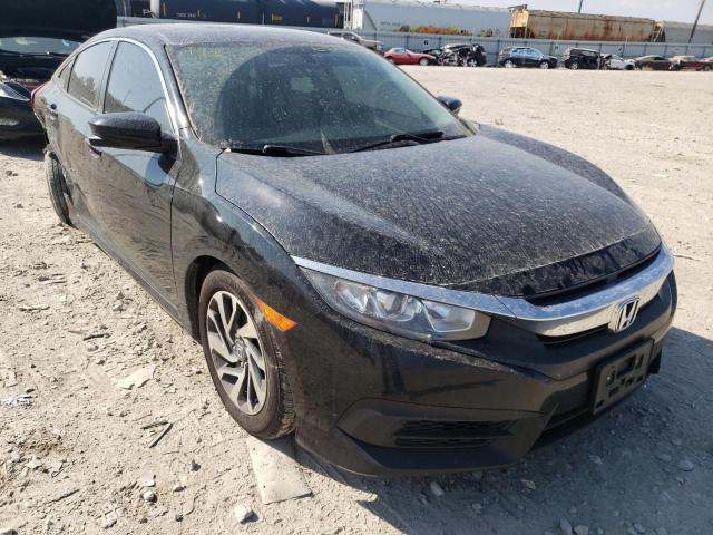 HONDA CIVIC EX 2018 with VIN 19XFC2F73JE204219 - Photo from auction