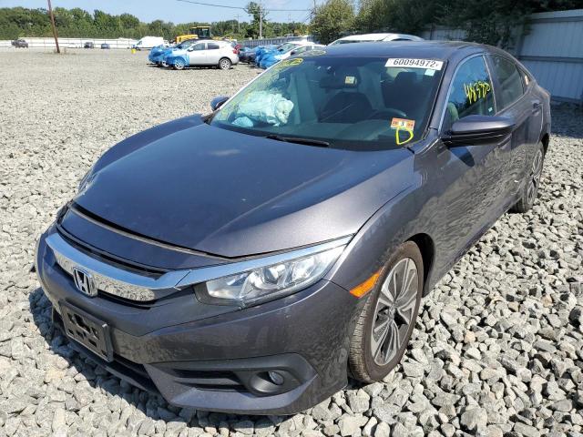 Photo 2 from auction – 2017 HONDA CIVIC EXL with VIN 2HGFC1F77HH657043