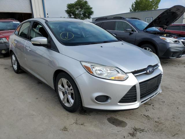 FORD FOCUS SE 2014 with VIN 1FADP3F28EL221123 - Photo from auction