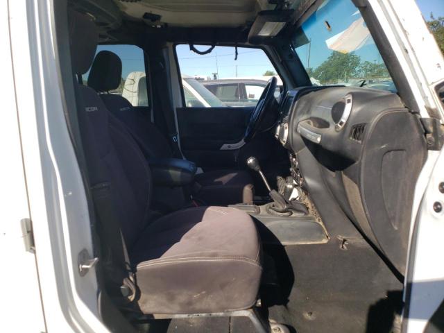 Photo 5 from auction – 2014 JEEP WRANGLER U with VIN 1C4BJWFG1EL118223