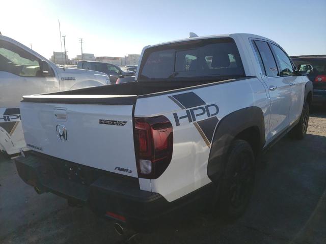 Photo 4 from auction – 2022 HONDA RIDGELINE with VIN 5FPYK3F70NB006531