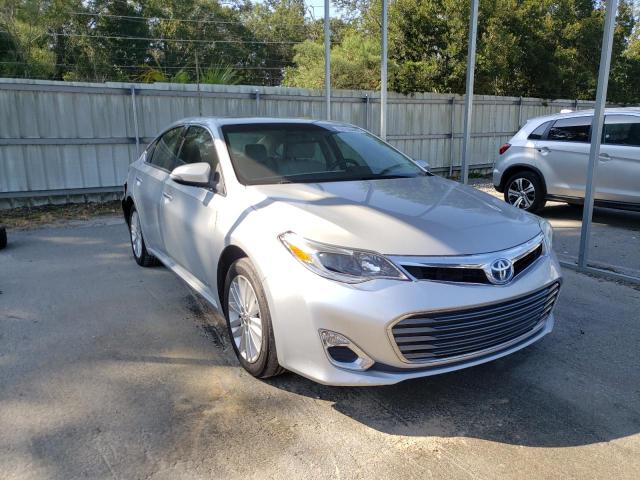 TOYOTA AVALON HYB 2014 with VIN 4T1BD1EB0EU020614 - Photo from auction
