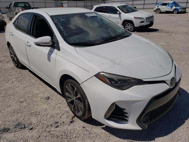 TOYOTA COROLLA L 2017 with VIN 5YFBURHE8HP688171 - Photo from auction