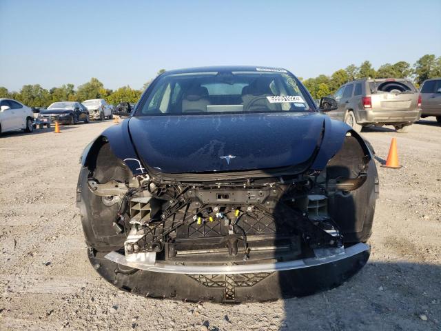 Photo 9 from auction – 2022 TESLA MODEL 3 with VIN 5YJ3E1EB3NF190383