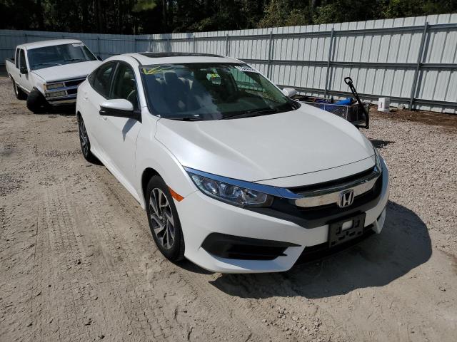 HONDA CIVIC EX 2018 with VIN 19XFC2F75JE209826 - Photo from auction
