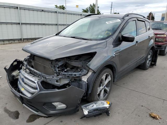 Photo 2 from auction – 2017 FORD ESCAPE SE with VIN 1FMCU9GD2HUC19721