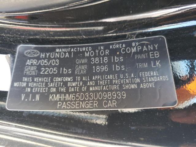 Photo 10 from auction – 2003 HYUNDAI TIBURON with VIN KMHHM65D33U098939