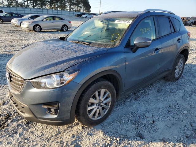 Photo 2 from auction – 2016 MAZDA CX-5 TOURI with VIN JM3KE2CY6G0878170
