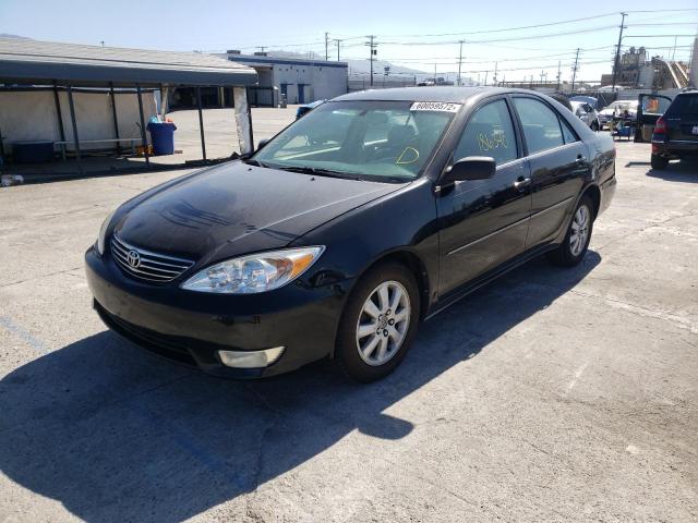 Photo 2 from auction – 2003 TOYOTA CAMRY LE with VIN JTDBE32K930242283