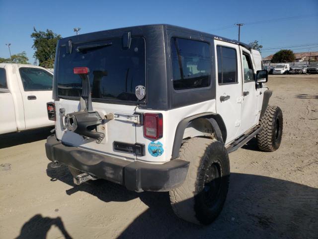 Photo 4 from auction – 2014 JEEP WRANGLER U with VIN 1C4BJWFG1EL118223