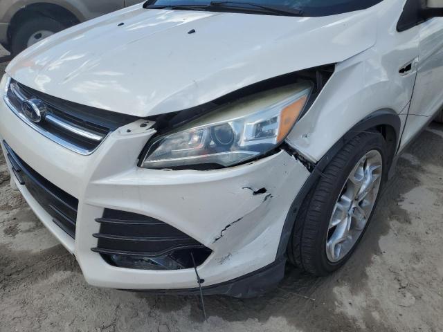 Photo 9 from auction – 2014 FORD ESCAPE TIT with VIN 1FMCU0JX4EUB05326