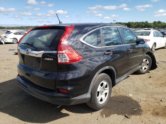 Photo 4 from auction – 2015 HONDA CR-V LX with VIN 2HKRM4H34FH705039