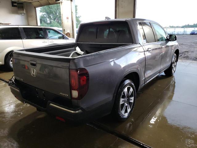 Photo 4 from auction – 2018 HONDA RIDGELINE with VIN 5FPYK3F73JB012317
