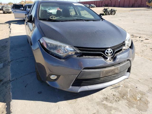 Photo 9 from auction – 2014 TOYOTA COROLLA EC with VIN 5YFBPRHEXEP029317