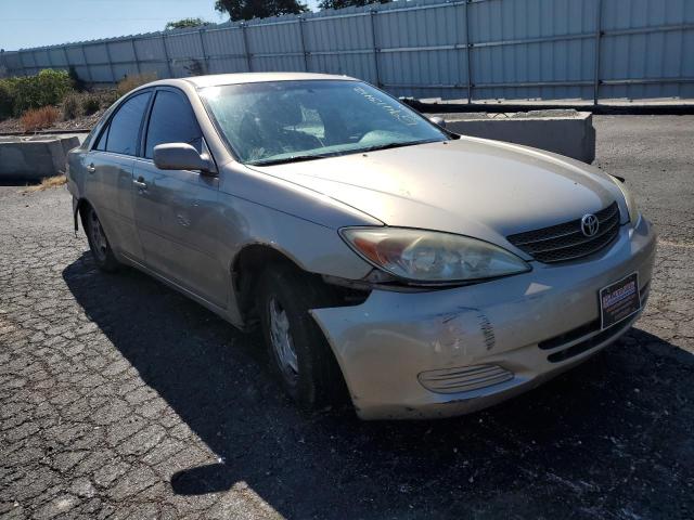 TOYOTA CAMRY LE 2002 with VIN 4T1BF32K32U501270 - Photo from auction