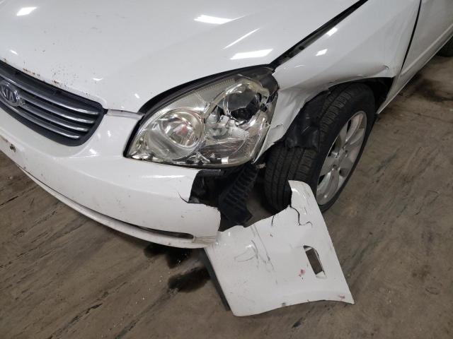 Photo 9 from auction – 2007 KIA OPTIMA LX with VIN KNAGE123775107540