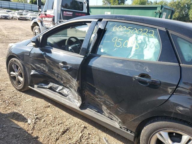 Photo 9 from auction – 2013 FORD FOCUS SE with VIN 1FADP3F27DL321048