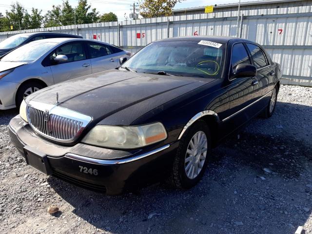 Photo 2 from auction – 2003 LINCOLN TOWN CAR E with VIN 1LNHM81W13Y613092