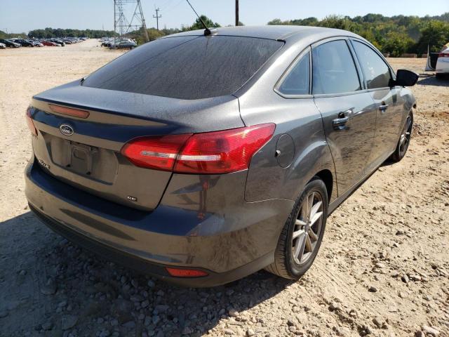 Photo 4 from auction – 2015 FORD FOCUS SE with VIN 1FADP3F2XFL329700