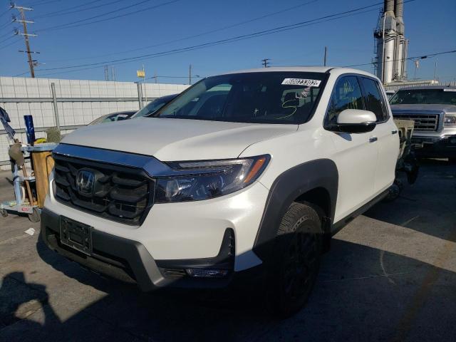 Photo 2 from auction – 2022 HONDA RIDGELINE with VIN 5FPYK3F70NB006531