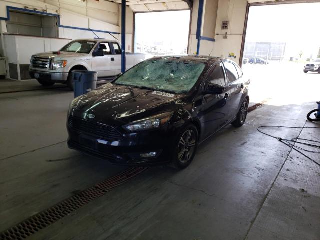 Photo 2 from auction – 2016 FORD FOCUS SE with VIN 1FADP3FE0GL396110