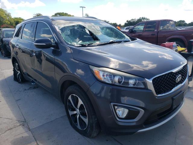 KIA SORENTO EX 2016 with VIN 5XYPH4A12GG020566 - Photo from auction