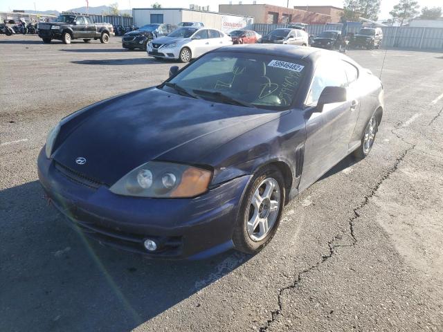 Photo 2 from auction – 2004 HYUNDAI TIBURON with VIN KMHHM65D84U138479