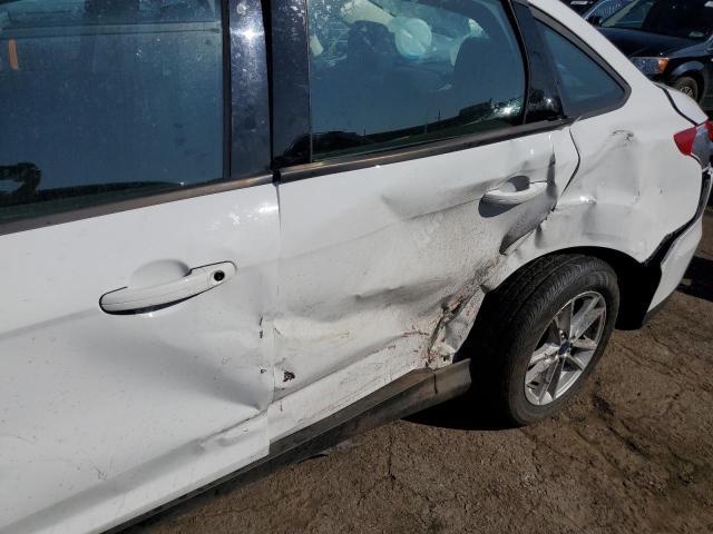 Photo 9 from auction – 2018 FORD FOCUS SE with VIN 1FADP3F24JL270748