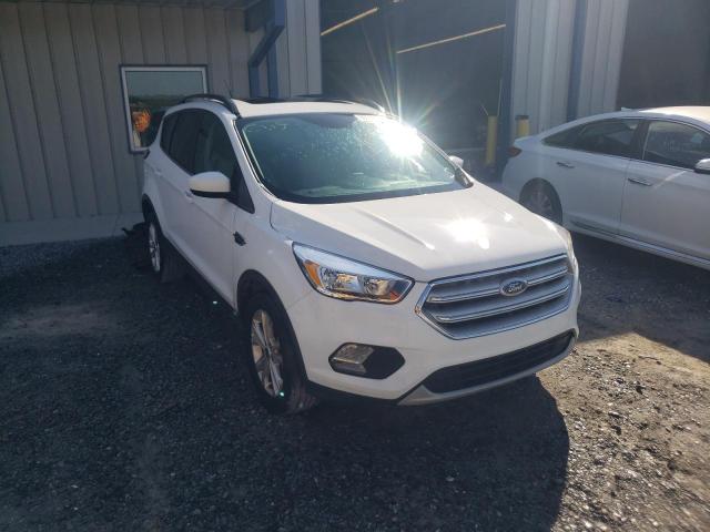 FORD ESCAPE SE 2018 with VIN 1FMCU0GD8JUC10801 - Photo from auction