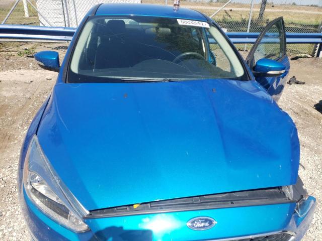 Photo 7 from auction – 2016 FORD FOCUS SE with VIN 1FADP3F25GL386811