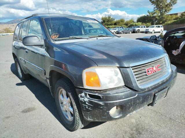 GMC ENVOY 2004 with VIN 1GKDS13S242418332 - Photo from auction