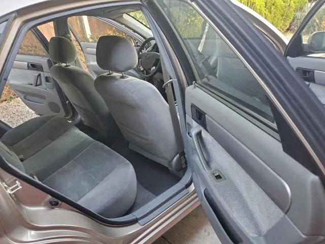 Photo 6 from auction – 2004 SUZUKI FORENZA S with VIN KL5JD52Z44K954414