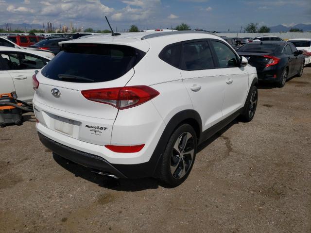 Photo 4 from auction – 2016 HYUNDAI TUCSON LIM with VIN KM8J33A21GU057139