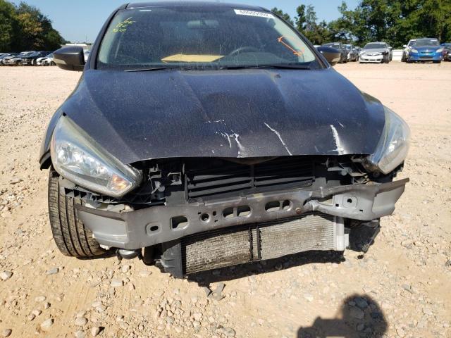 Photo 9 from auction – 2015 FORD FOCUS SE with VIN 1FADP3F2XFL329700