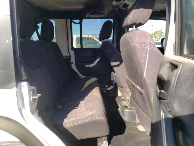 Photo 6 from auction – 2014 JEEP WRANGLER U with VIN 1C4BJWFG1EL118223